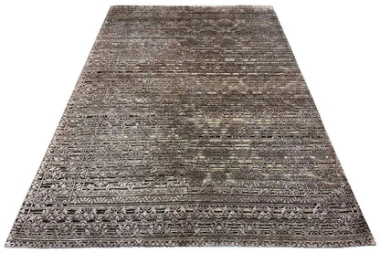 Gray rug with a vintage relief pattern, border around the edge, uniform texture