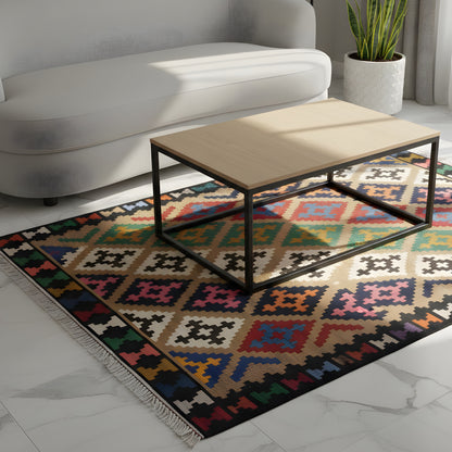 Kilim rug with a colorful diamond and cross pattern, rectangular, with fringes.