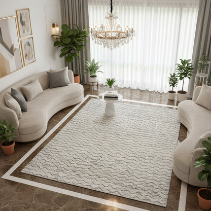 Berber rug in the center of the room, light beige with a gray zigzag pattern