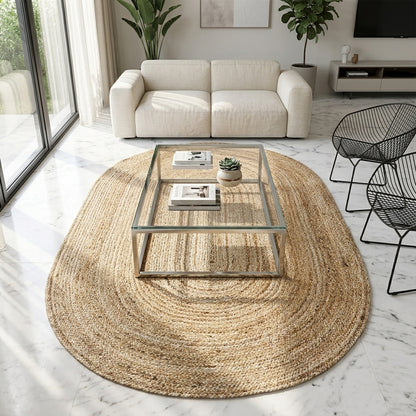 Round jute rug with a braided pattern in natural color