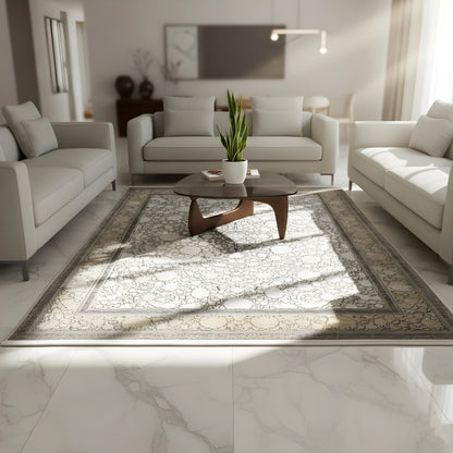 Rectangular silver-gray rug with floral ornaments and a gold border