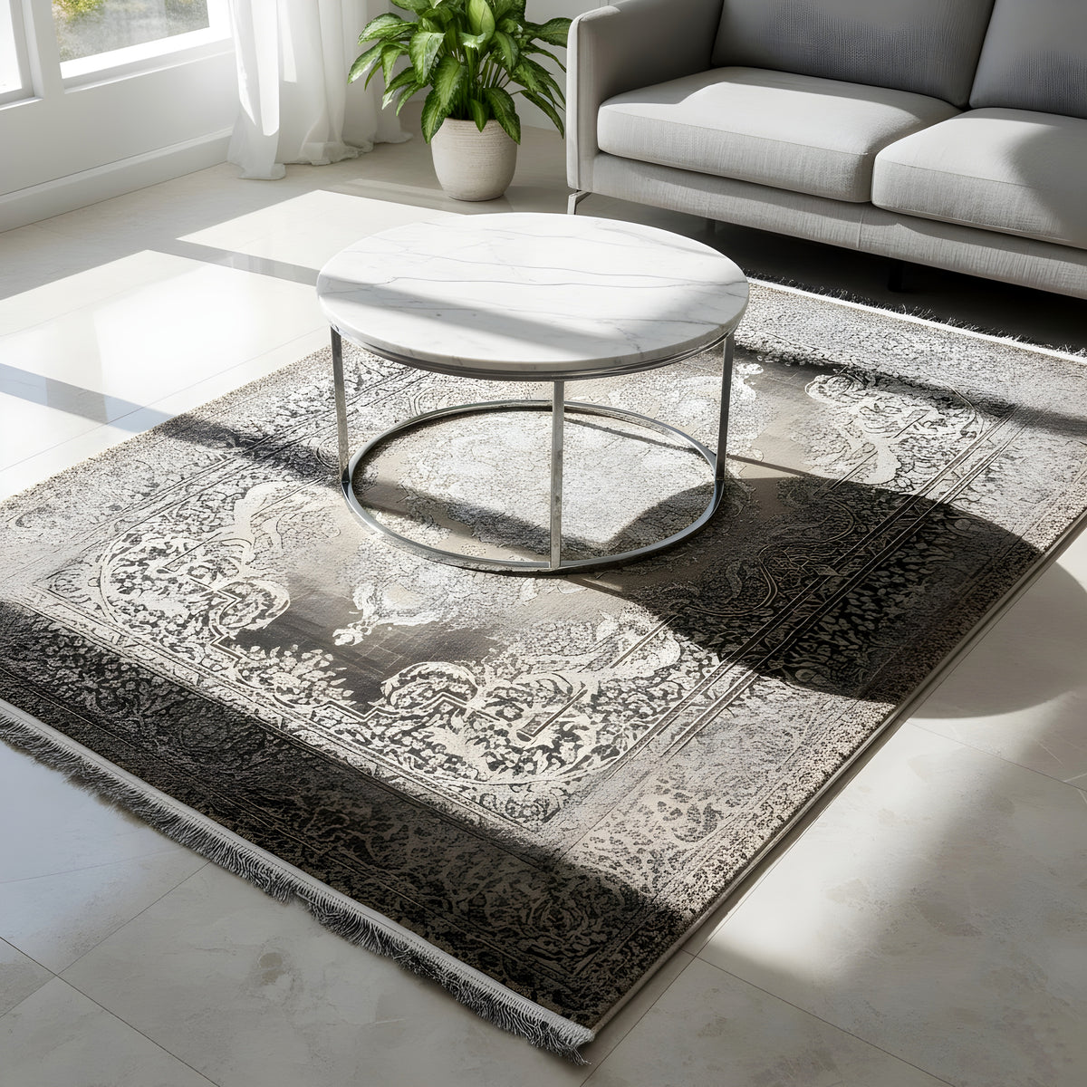 Rug with a large medallion pattern, silver-gray ornamentation on a dark background