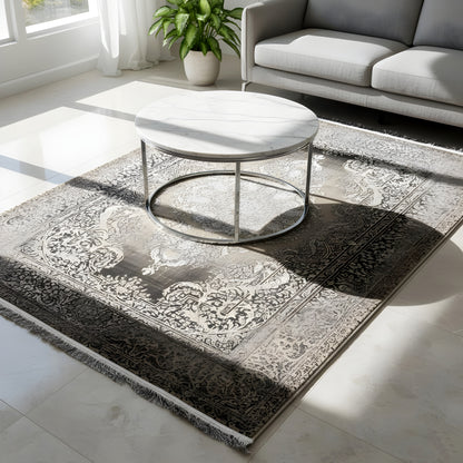 Rug with a large medallion pattern, silver-gray ornamentation on a dark background