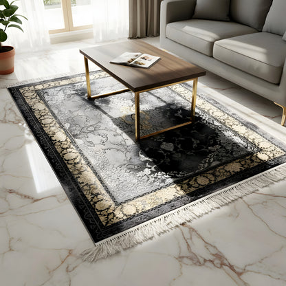 Rug with a gray Baroque pattern, gold border, and fringe along the edge