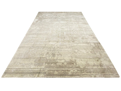 Gray designer rug with a wide central section and uniform ornamental texture