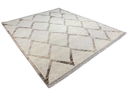 Berber rug with a square design featuring beige and gray cubes in the border