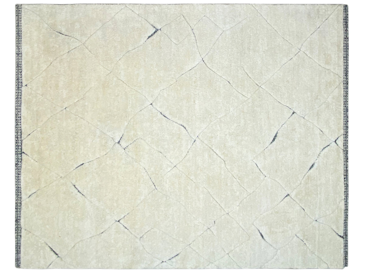 Rectangular cream rug with a delicate linear pattern and blue border