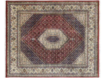Bidjar rug with central medallion and surrounding border, red, blue, and cream