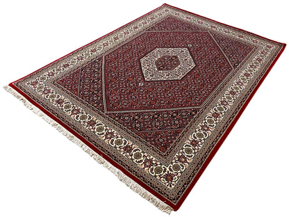 Red Bidjar rug with a central medallion, decorative border and fringes, approx. 244x173 cm
