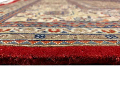 Bidjar rug with a red border, fine pile, and detailed geometric pattern