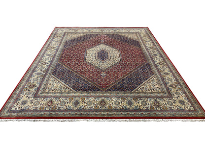 Bidjar rug, square medallion pattern in red, blue, and cream, fully rolled out
