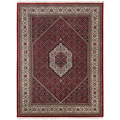 Rug 244x170 cm front view: red field with central medallion and fringes