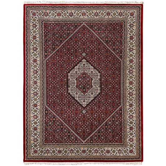 Rug 244x170 cm front view: red field with central medallion and fringes
