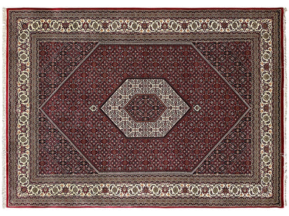 Bidjar carpet front view: dark red, ornamental border, and beige central medallion