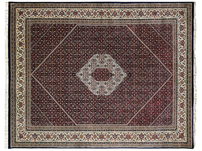 Frontal view of a Bidjar rug with a central medallion and richly decorated border