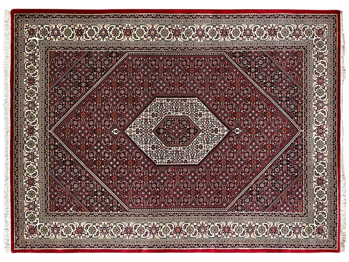 Reddish-brown rug with Bidjar ornaments, a wide decorative border, and a rectangular pattern