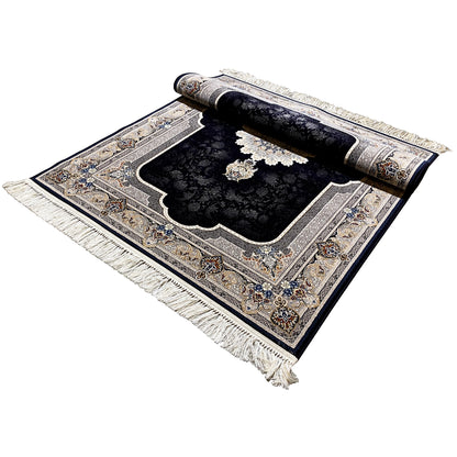 Black rug with an oriental pattern, wide border, and fringes