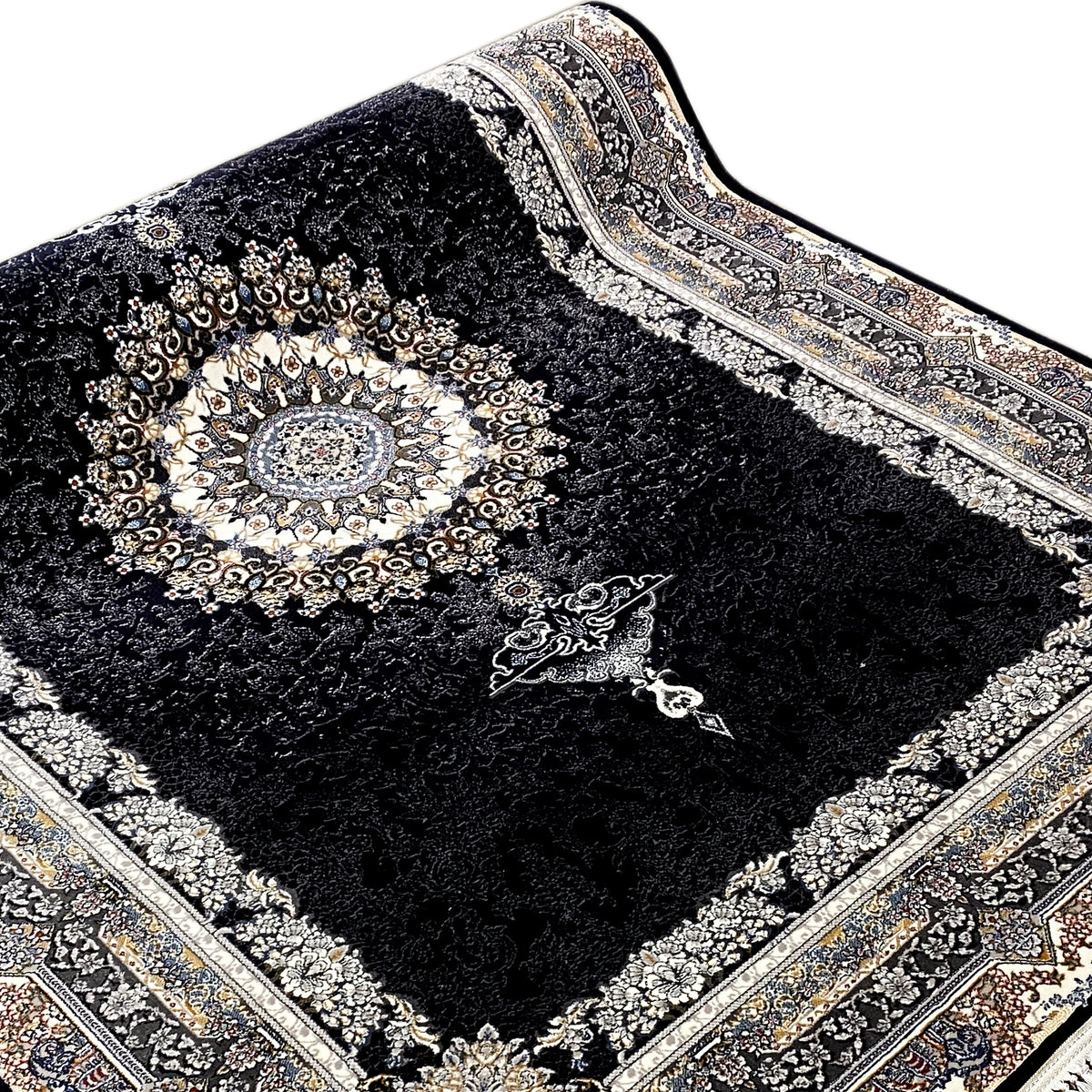 Black rug with a round medallion, floral ornaments, and fringe