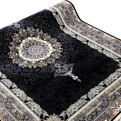 Black rug with a round medallion, floral ornaments, and fringe