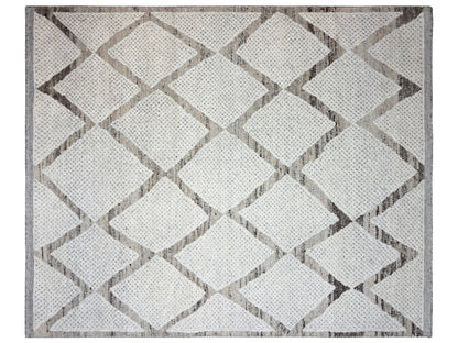 Rectangular Berber rug with zigzag and cube patterns in beige and gray