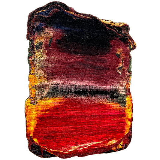 Designer rug: red central area with an orange-yellow stripe and a dark background pattern