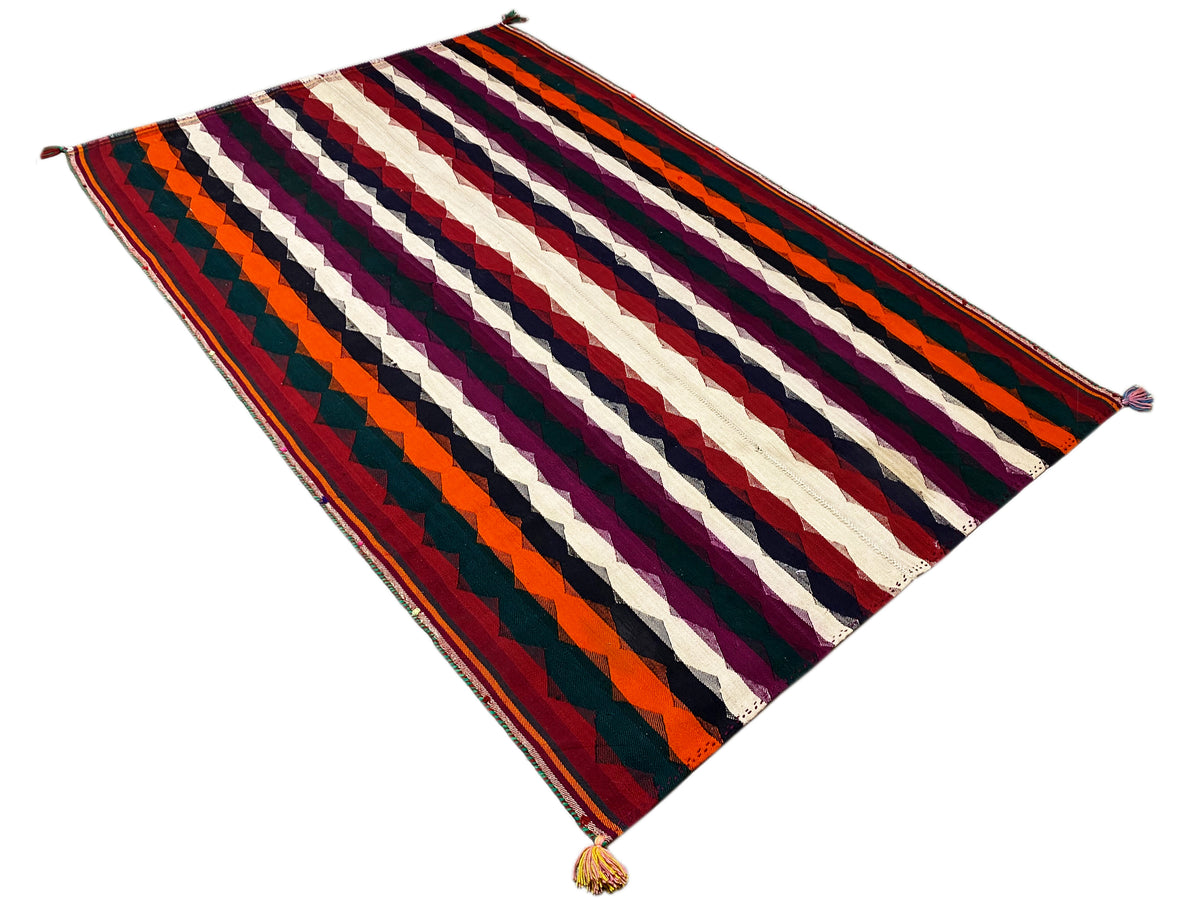 Colorful Jajim rug with diagonal stripes and tassels at the corners