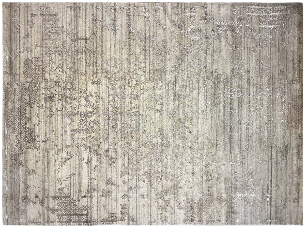 Gray designer rug with vertical stripes and an ornamental border along the edges
