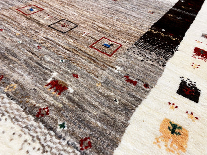 Gabbeh runner with simple stripes and small patterned squares in beige, gray, and dark red