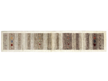 Rectangular Gabbeh runner rug with a multicolored ornamental border.