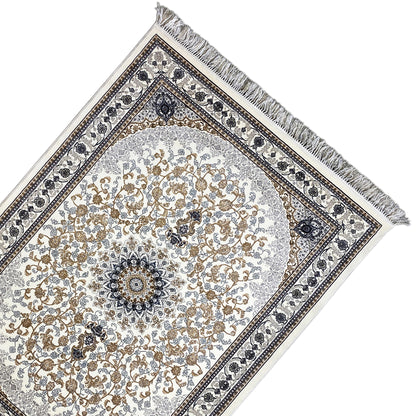 Leyla oriental rug angled view, cream-colored pile, medallion, dark blue borders and fringes
