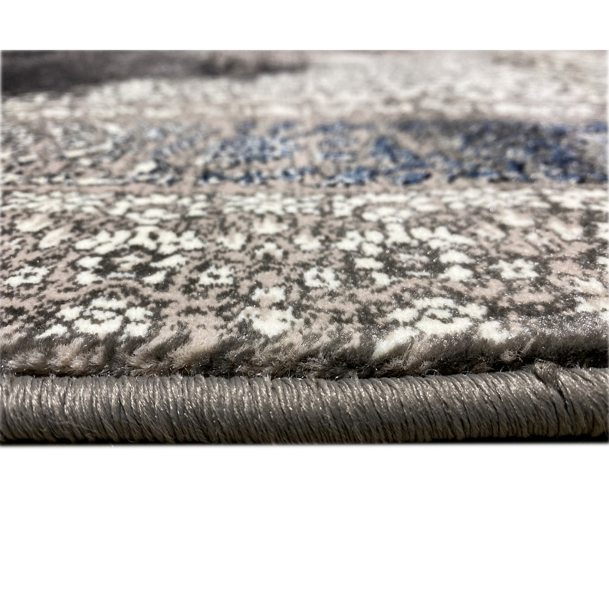 Oriental rug 160x230 pile detail: blue-silver pattern, bordered edge with fringes