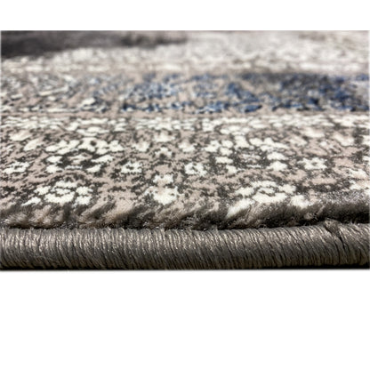Oriental rug 160x230 pile detail: blue-silver pattern, bordered edge with fringes
