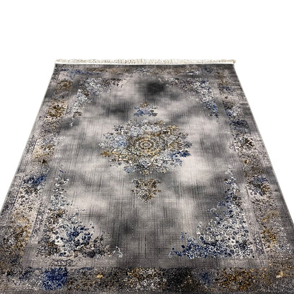 Flat rug with a large central medallion, gray with blue and gold ornaments, bordered edge