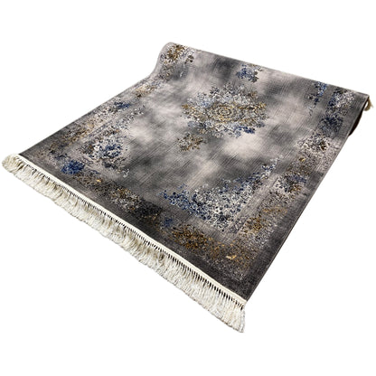 Medallion rug 160x230 cm, laid at an angle: gray, blue-and-gold embellishments, white fringes