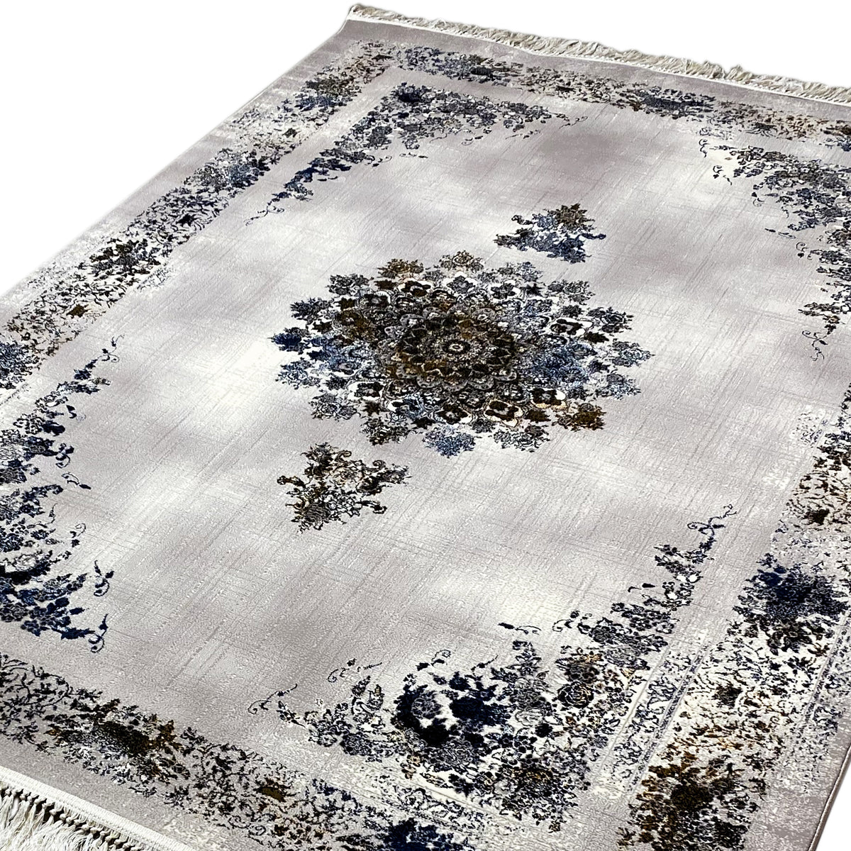 Detail view: Medallion rug 160x230 with a central blue and brown pattern, white pile, fringes