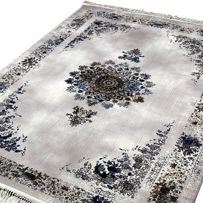 Detail view: Medallion rug 160x230 with a central blue and brown pattern, white pile, fringes