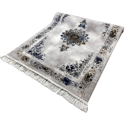 Medallion rug 160x230, white background with a floral medallion in blue and brown, fringes