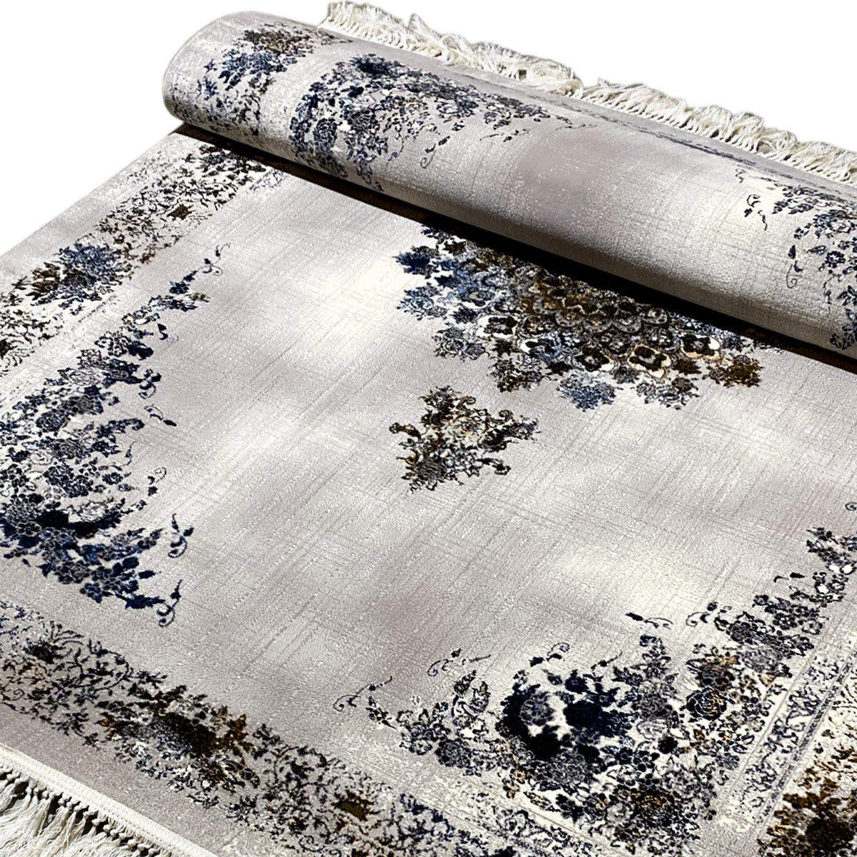 Medal rug with a light-colored background, blue and gold ornaments, and fringes