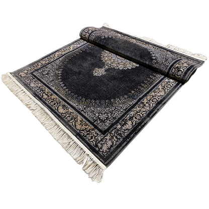 Medallion rug appearing rolled up: dark pile, golden ornamental border, fringe