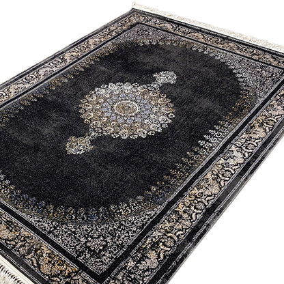 Medallion rug detail: dark patterned field with medallion, two-tone ornamental border