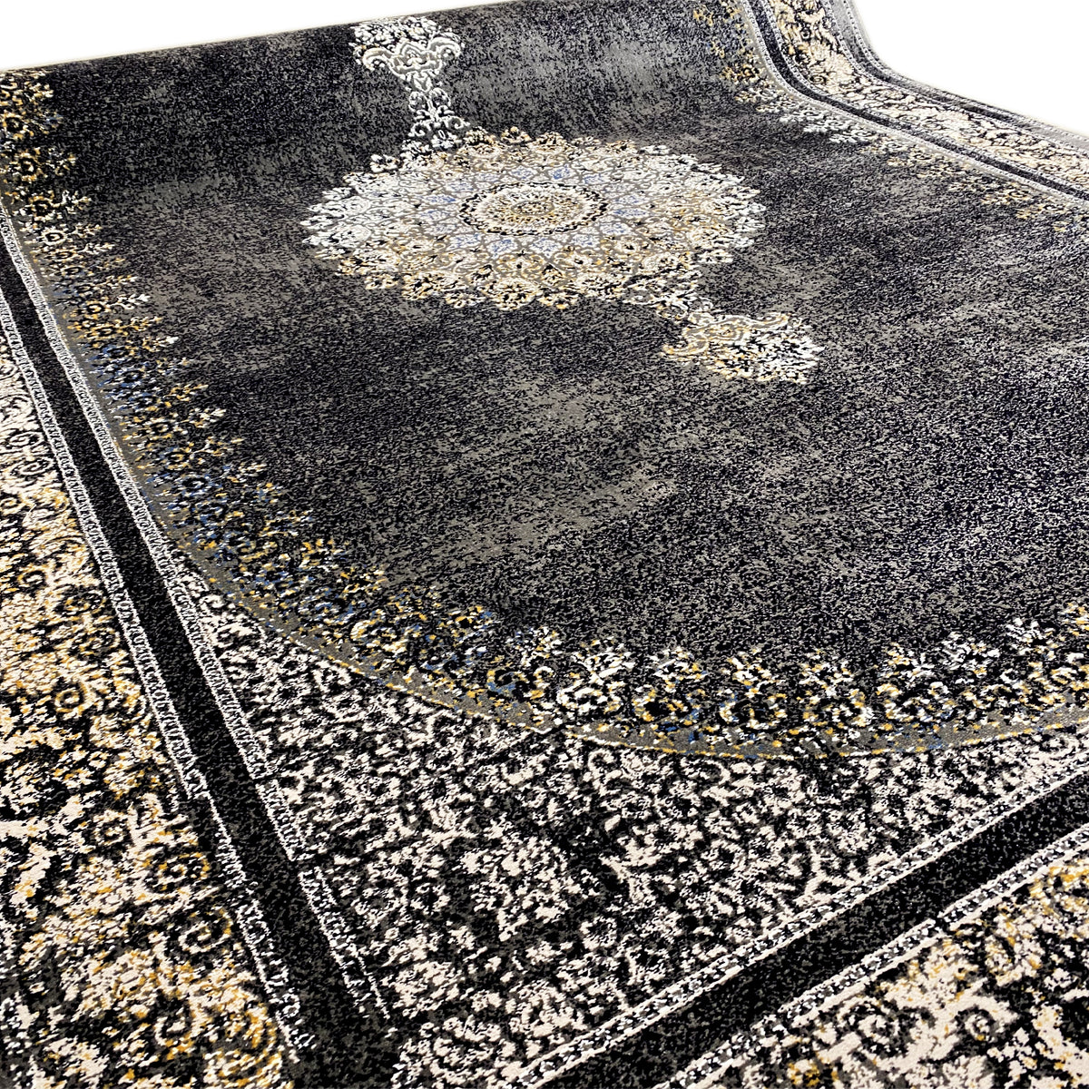 Dark gray medallion rug with a central ornamental medallion and decorative border