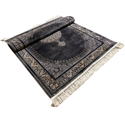 Dark gray medallion rug with vintage ornaments, rolled and fringed