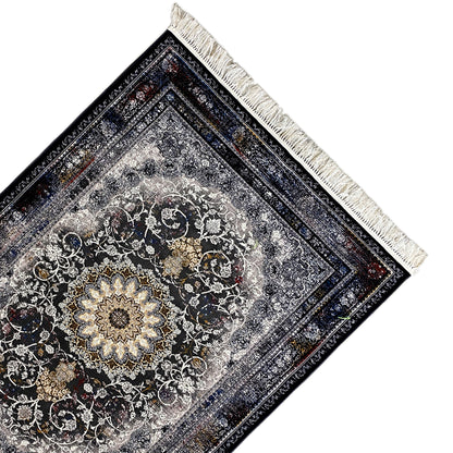 Persian rug close-up: silver ornamental field, dark blue linear border, and cream fringe