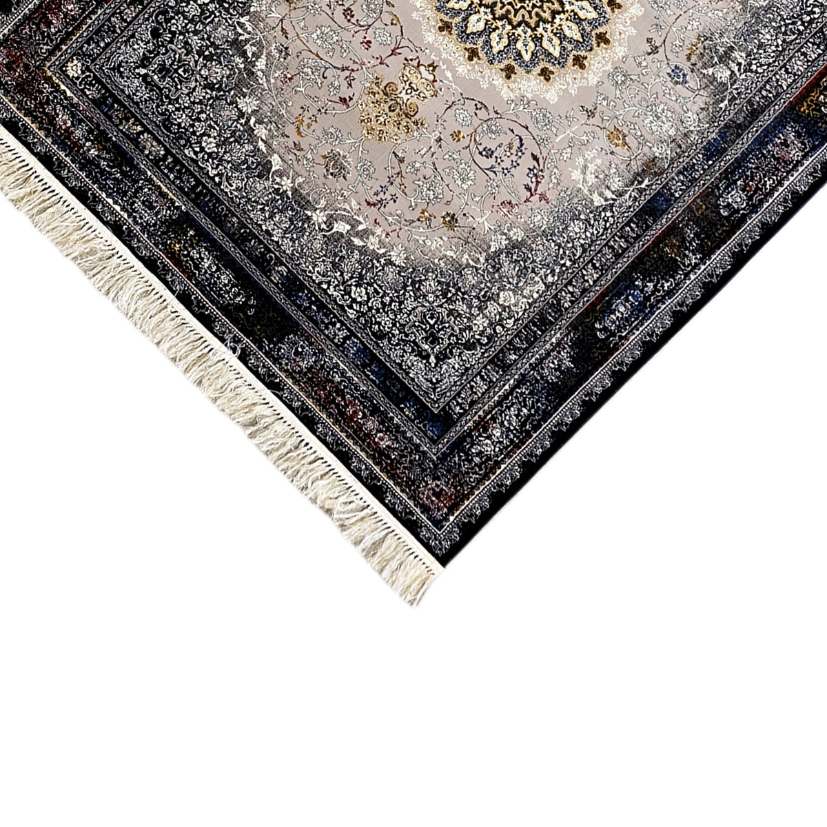 Medallion rug on a diagonal, close-up: dark border and fringes, gray-cream ornamental field