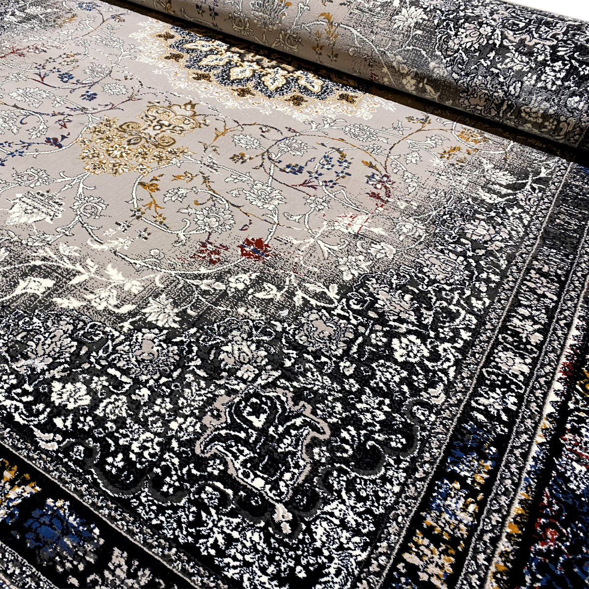 Carpet detail with medallion, black-dark blue border, beige background, fine ornaments