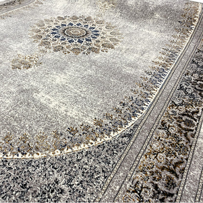Silver-gray rug with an ornamental border and blue-gold accents, fringes