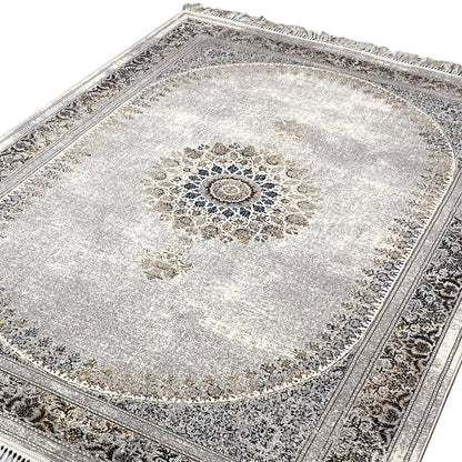 Silver-gray rug with a round medallion, dark Oriental border, and fringes