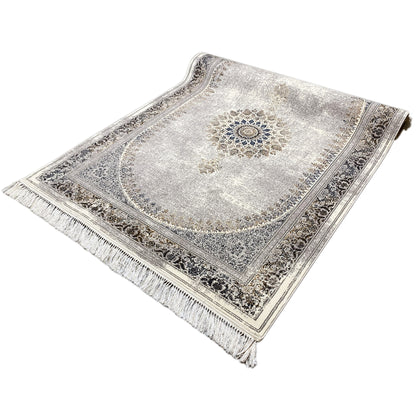 Rectangular vintage rug in silver gray with ornamentation, medallion, and fringes