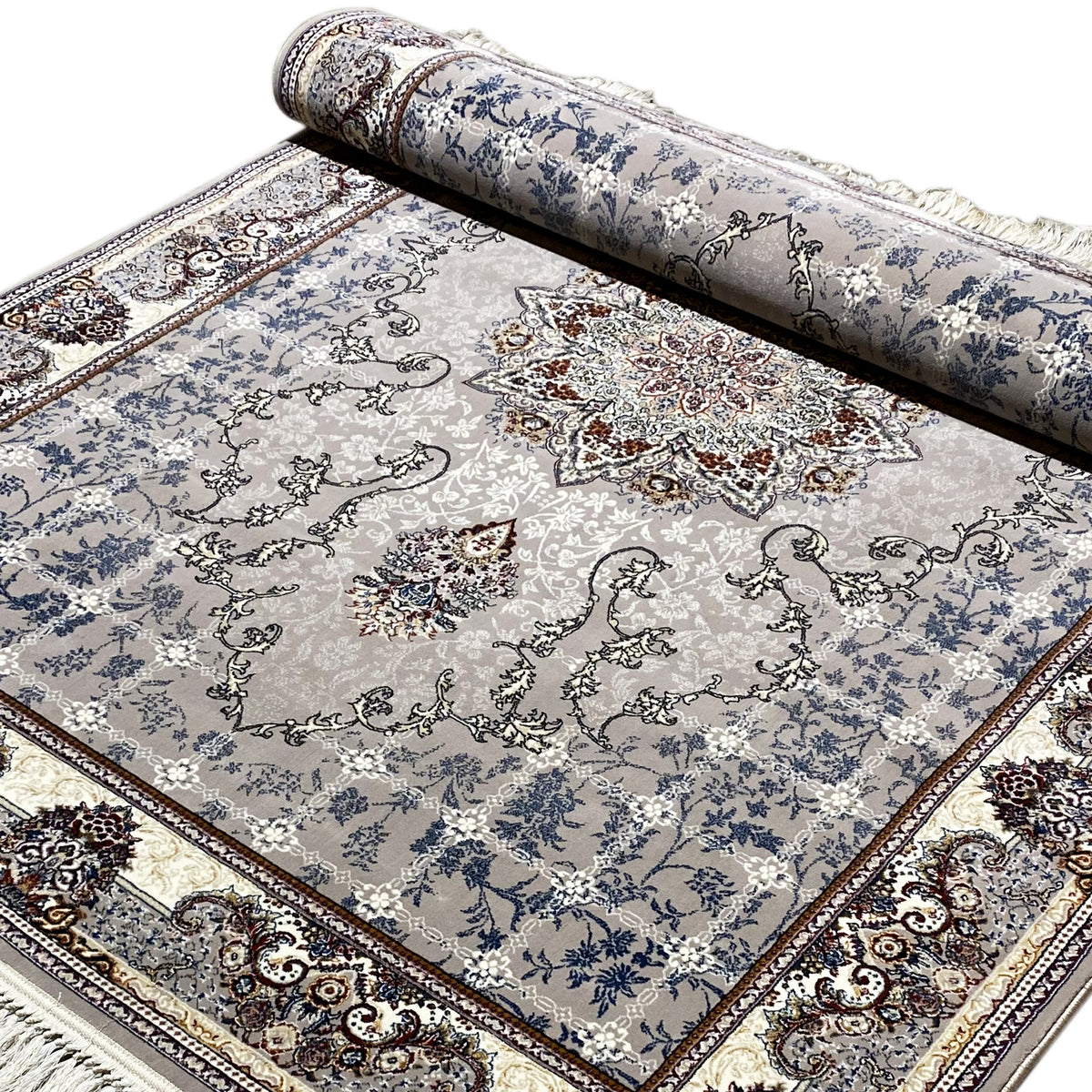 Rolled Nain rug: blue ornamental design with central motifs and fringes along the edge
