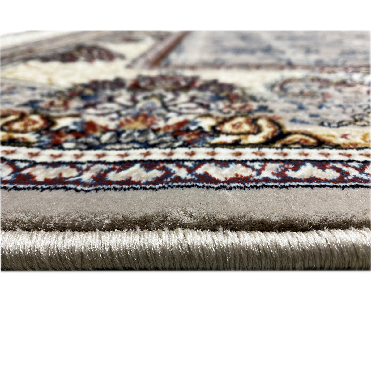 Rug edge with short fringes and colored decorative lines along the border
